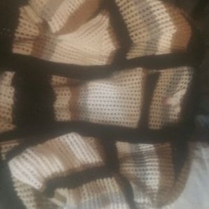 Short sleeve but the length is passed the knee knit cardigan shaw